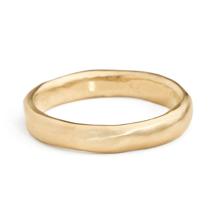 4mm half round wedding band with a soft handmade texture. Handmade in Brooklyn NY 14kt  or 18kt recycled gold. The 4mm wide gold band