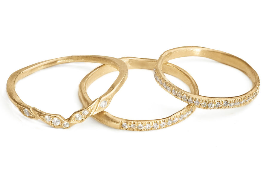 Pave diamond gold stacking rings and wedding bands 