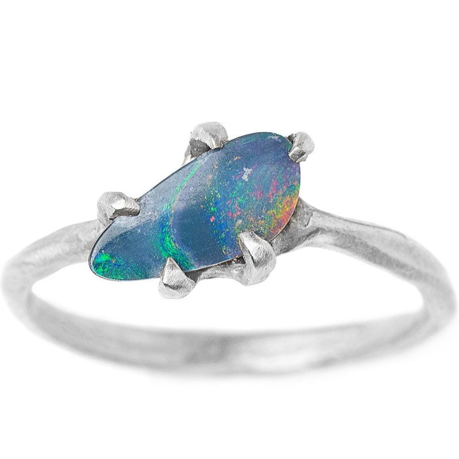 Fiery opal ring prong set in delicate white gold