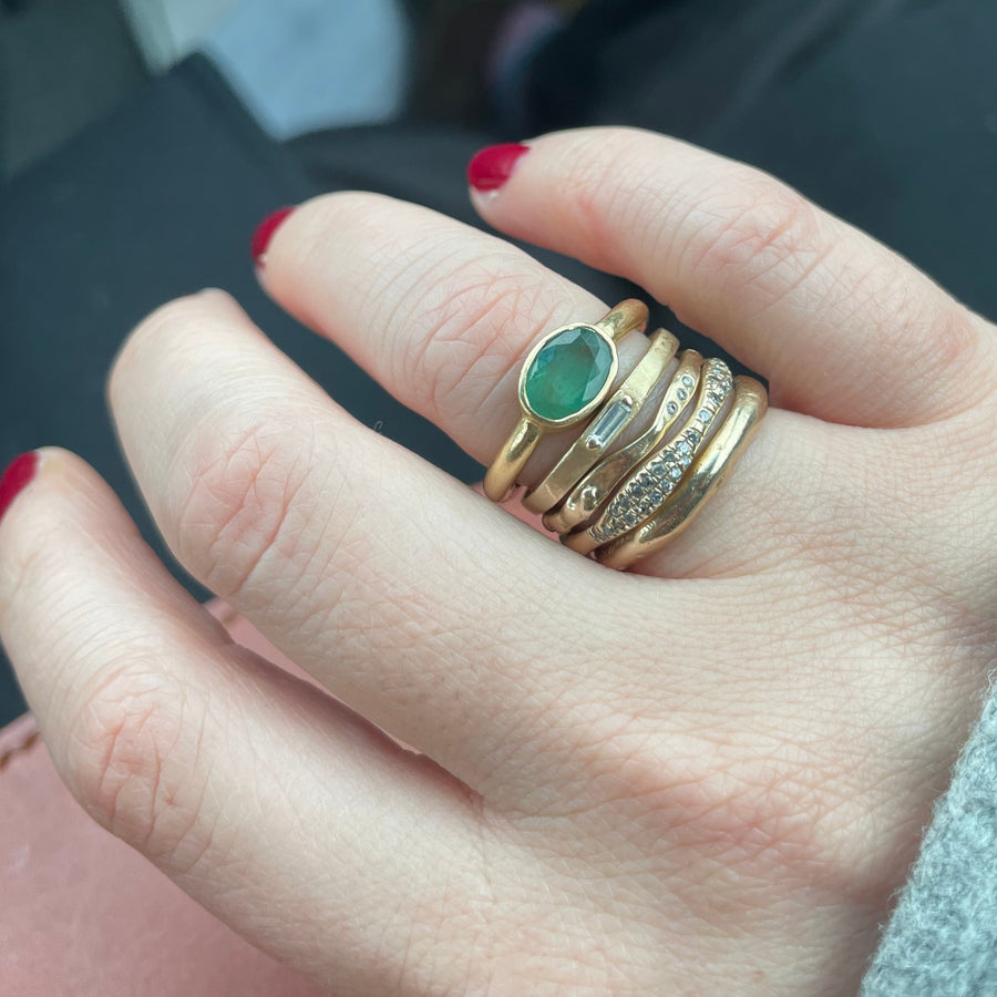 Oval emerald bezel ring