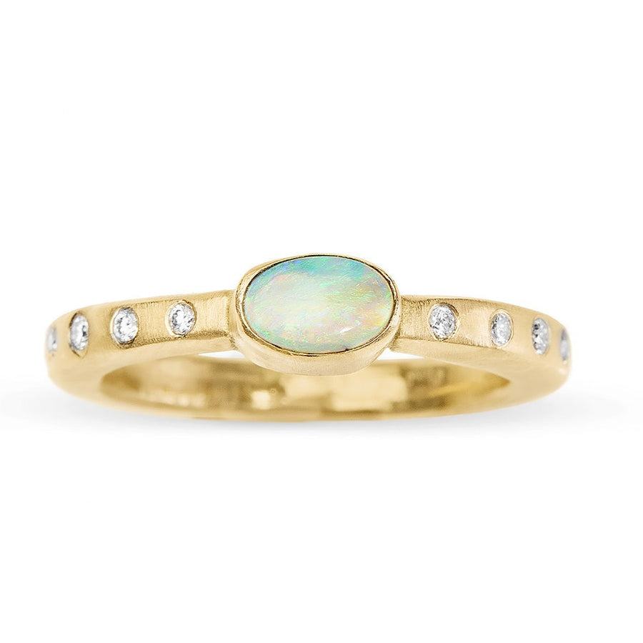 Handmade oval Fiery Opal Set in 18kt recycled yellow gold square band with side diamonds. A beautiful alternative engagement ring or additional to any ring stack. 