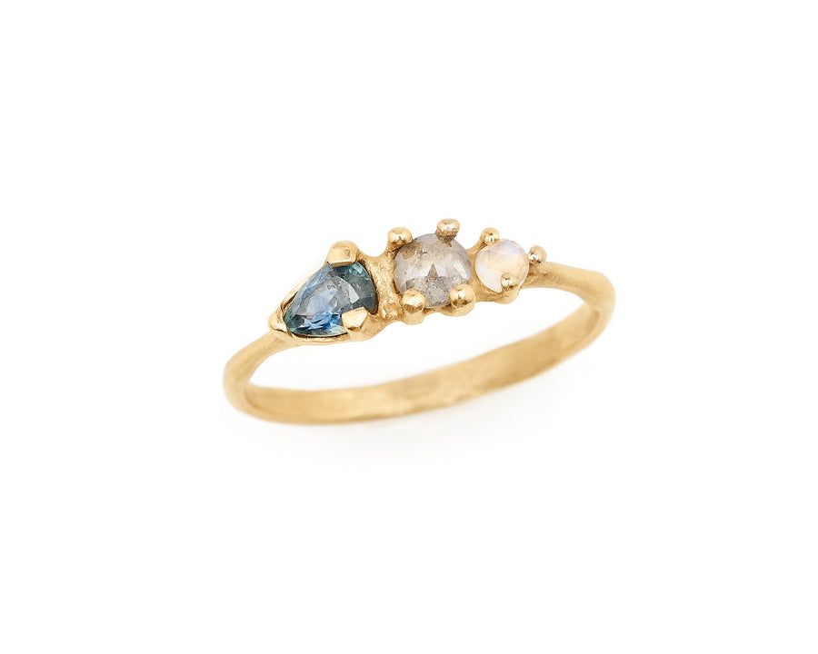 Montana Blue sapphire, grey rose cut diamonds and moonstone three stone ring in recycled 14kt yellow gold. Handmade in Brooklyn NY
