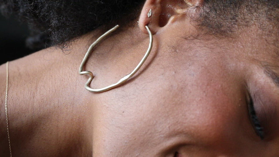 Large Gold Hoops with a twist. Perfect everyday hoop earrings 