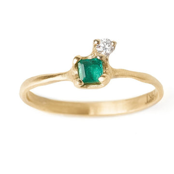 Emerald and diamond ring. Affordable alternative engagement ring set in 14kt yellow gold