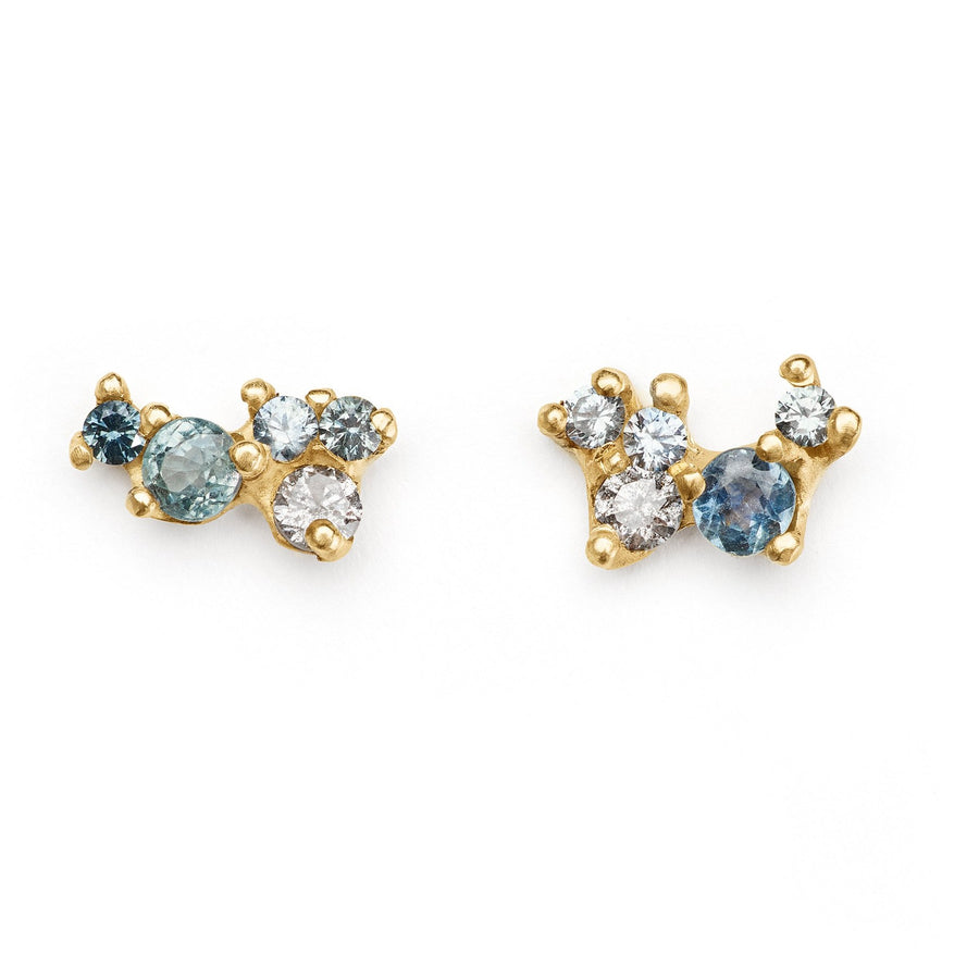 Gemstone cluster studs hand-made in Brooklyn. Montana Sapphires and grey diamond cluster stone earrings set in 14kt yellow gold 
