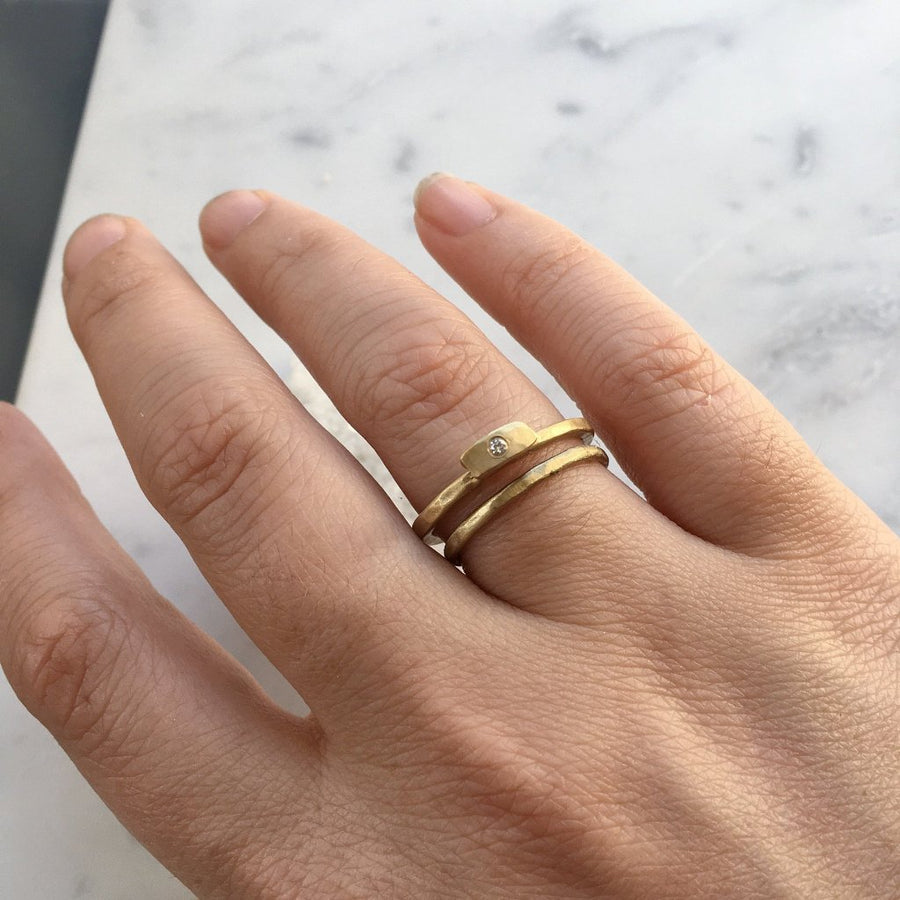 Hammered 14kt gold stacking ring with diamond. Simple rustic and unique engagment ring style