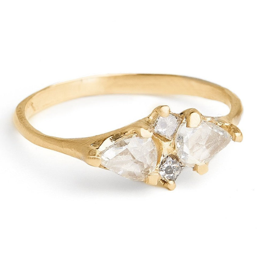 rose cut pear shaped white diamonds and princess cut grey diamond alternative diamond engagement ring set in 14kt yellow gold