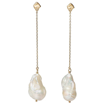 Statement earrings large baroque pearls suspended from 14kt gold studs