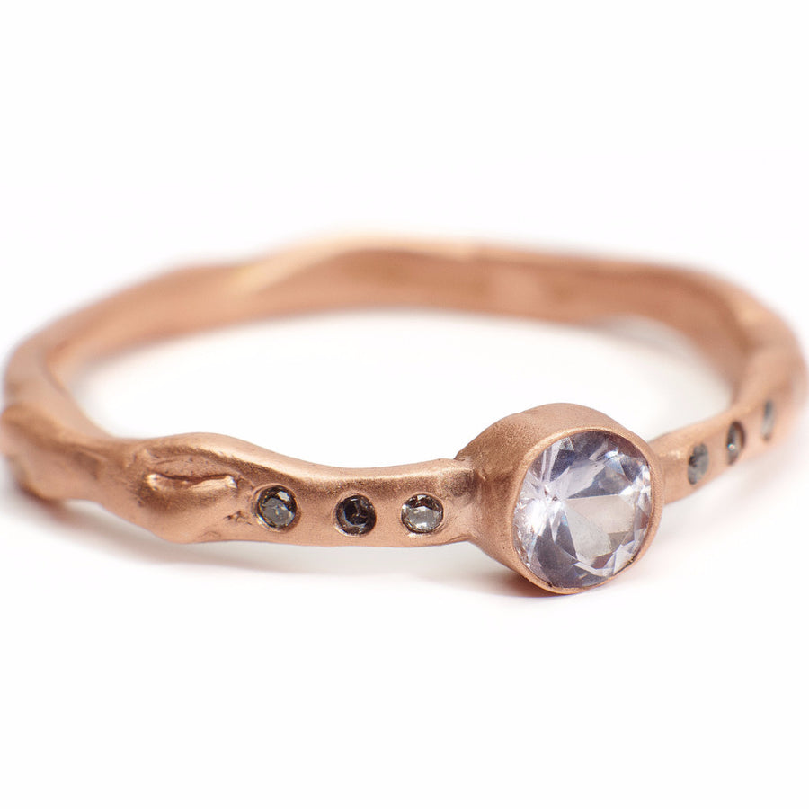 Blush sapphire and reclaimed grey diamond ring set in 14kt recycled rose gold. Handmade organic setting.  Sustainable and affordable engagment rings made in Brooklyn NY using recycled gold and reclaimed sustainable gemstones. Alternative bridal 