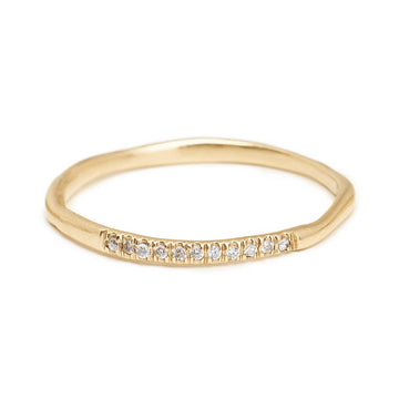 delicate 14kt gold 1.5mm band with pave diamonds wedding bands