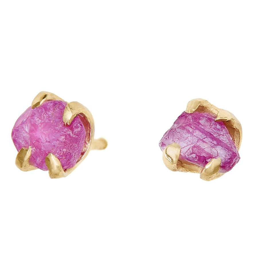 Rough hot pink natural Montana Sapphire stud earrings set in 14kt yellow gold. Handmade in Brooklyn. 