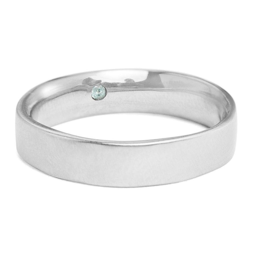 5mm square white gold men's band with comfort fit and secret emerald set inside 