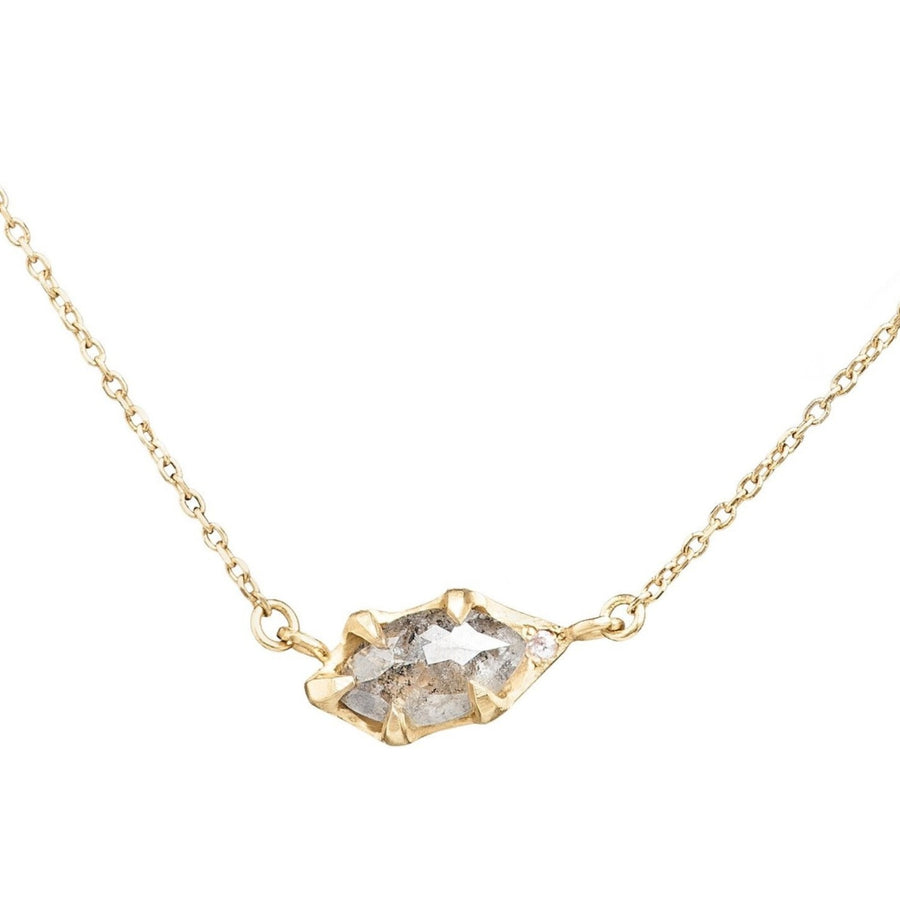 Marquis salt and pepper rose cut diamond set in handmade 14kt gold setting with a pink diamond accent. Diamond necklace set horizontally on a delicate chain 