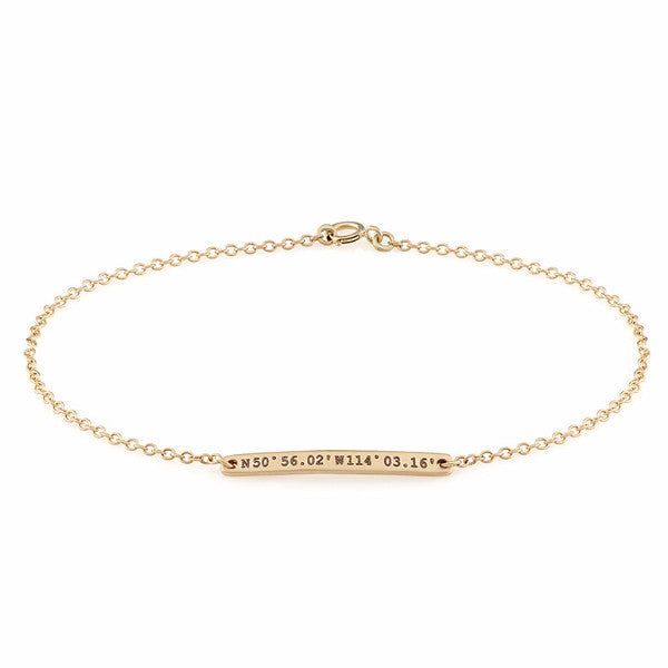 Custom engraved ID bracelet with meaningful coordinates.