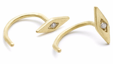 Unusal diamond shaped earrings. Inez claw huggeie style earrings are edgy everyday studs. Set in 14kt gold with pave set diamond.  